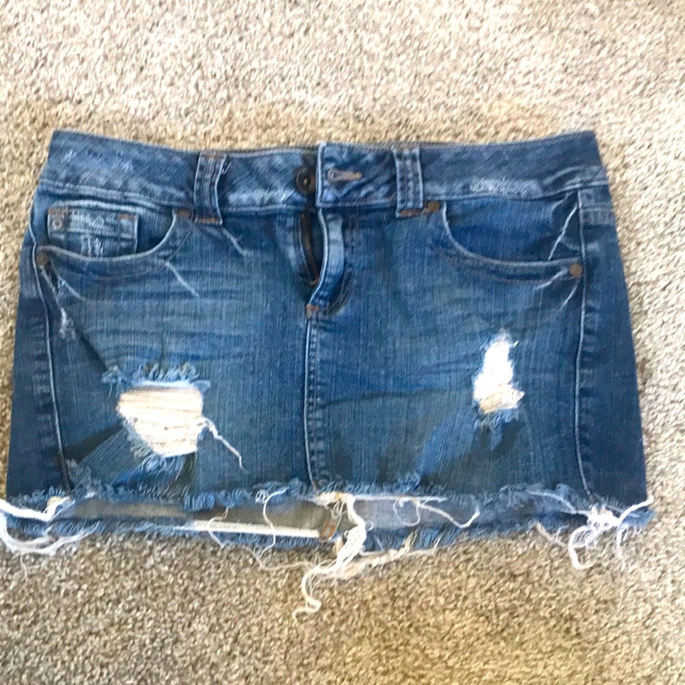 SOLD: Distressed denim mini skirt
